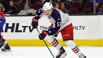 CLEVELAND, OH - NOVEMBER 09: Cleveland Monsters defenceman Gabriel Carlsson (53) plays the puck during the third period the American Hockey League game between the Laval Rocket and Cleveland Monsters on November 9, 2018, at Quicken Loans Arena in Cleveland, OH. (Photo by Frank Jansky/Icon Sportswire via Getty Images)