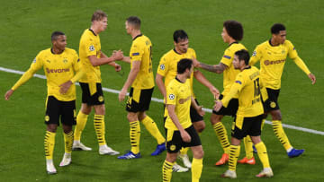 Borussia Dortmund players celebrate a goal (Photo by Martin Meissner - Pool/Getty Images)