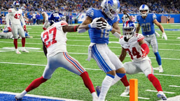 DETROIT, MI - OCTOBER 27: Kenny Golladay #19 of the Detroit Lions makes the touchdown catch as Deandre Baker #27 and Grant Haley #34 of the New York Giants defend during the third quarter of the game at Ford Field on October 27, 2019 in Detroit, Michigan. Detroit defeated New York 31-26. (Photo by Leon Halip/Getty Images)