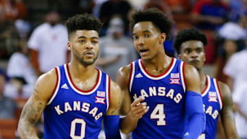 AUSTIN, TX - FEBRUARY 25: Frank Mason III #0 and Devonte' Graham #4 of the Kansas Jayhawks talk on court during the game with the Texas Longhorns at the Frank Erwin Center on February 25, 2017 in Austin, Texas. (Photo by Chris Covatta/Getty Images)