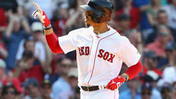 BOSTON, MA - MAY 02: Mookie Betts #50 of the Boston Red Sox celebrates after hitting a solo home run during the seventh inning against the Kansas City Royals at Fenway Park on May 2, 2018 in Boston, Massachusetts. (Photo by Tim Bradbury/Getty Images)