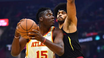 Oct 23, 2021; Cleveland, Ohio, USA; Cleveland Cavaliers center Jarrett Allen (31) defends Atlanta Hawks center Clint Capela (15) during the first quarter at Rocket Mortgage FieldHouse. Mandatory Credit: Ken Blaze-USA TODAY Sports