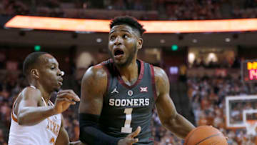 AUSTIN, TEXAS - JANUARY 19: Rashard Odomes #1 of the Oklahoma Sooners drives to the basket around Matt Coleman III #2 of the Texas Longhorns during first half action at The Frank Erwin Center on January 19, 2019 in Austin, Texas. (Photo by Chris Covatta/Getty Images)