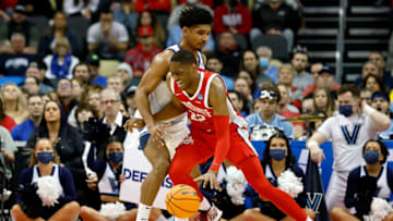 PITTSBURGH, PA - MARCH 20: Malaki Branham #22 of the Ohio State Buckeyes drives the ball against Jermaine Samuels #23 of the Villanova Wildcats during the second round of the 2022 NCAA Men's Basketball Tournament at PPG PAINTS Arena on March 20, 2022 in Pittsburgh, Pennsylvania. (Photo by Kirk Irwin/Getty Images)