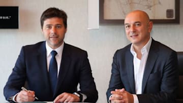ENFIELD,UNITED KINGDOM - MAY 12: Mauricio Pochettino, Manager of Tottenham Hotspur (L) poses with Chairman Daniel Levy after signing a new contract until 2021 at the Tottenham Hotspur Football Club Training Ground on May 12, 2016 in Enfield, England. (Photo by Tottenham Hotspur FC via Getty Images)