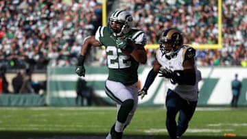 EAST RUTHERFORD, NJ - NOVEMBER 13: Matt Forte #22 of the New York Jets breaks a tackle as he runs downfield in the second quarter against the Los Angeles Rams at MetLife Stadium on November 13, 2016 in East Rutherford, New Jersey. (Photo by Michael Reaves/Getty Images)