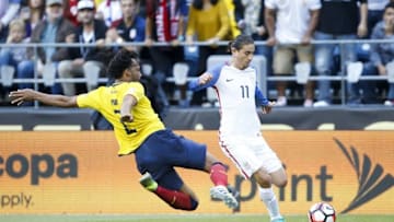 Jun 16, 2016; Seattle, WA, USA; United States midfielder Alejandro Bedoya (11) controls the ball against Ecuador defender Arturo Mina (2) during the first half of quarter-final play in the 2016 Copa America Centenario soccer tournament at Century Link Field. Mandatory Credit: Jennifer Buchanan-USA TODAY Sports