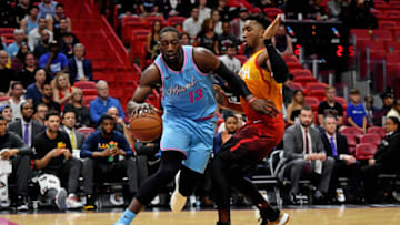 Miami Heat center Bam Adebayo (13) drives the ball around Utah Jazz guard Donovan Mitchell (45)( Jasen Vinlove-USA TODAY Sports)