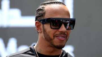 BAHRAIN, BAHRAIN - MARCH 30: Lewis Hamilton of Great Britain and Mercedes GP looks on in the Paddock before final practice for the F1 Grand Prix of Bahrain at Bahrain International Circuit on March 30, 2019 in Bahrain, Bahrain. (Photo by Charles Coates/Getty Images)