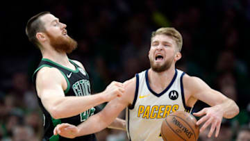 BOSTON, MA - APRIL 14: Aron Baynes #46 of the Boston Celtics, left, defends against Domantas Sabonis #11 of the Indiana Pacers during the second half in Game 1 of a first-round NBA basketball playoff series at TD Garden in Boston, Massachusetts on April 14, 2019. (Staff Photo By Christopher Evans/MediaNews Group/Boston Herald via Getty Images)