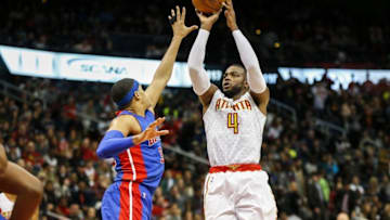 Dec 30, 2016; Atlanta, GA, USA; Atlanta Hawks forward Paul Millsap (4) shoots the ball against the Detroit Pistons in the third quarter at Philips Arena. The Hawks won 105-98. Mandatory Credit: Brett Davis-USA TODAY Sports