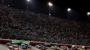DARLINGTON, SC - SEPTEMBER 03: Denny Hamlin, driver of the #11 Sport Clips Toyota, Kyle Busch, driver of the #18 M&M's Caramel Toyota, and Brad Keselowski, driver of the #2 Miller Genuine Draft Ford. (Photo by Jerry Markland/Getty Images)