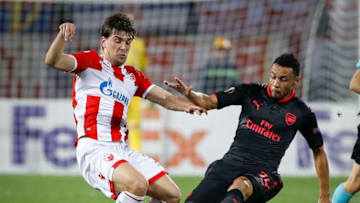 BELGRADE, SERBIA - OCTOBER 19: Filip Stojkovic (L) of Crvena Zvezda is challenged by Francis Coquelin (R) of Arsenal during the UEFA Europa League group H match between Crvena Zvezda and Arsenal FC at Rajko Mitic Stadium on October 19, 2017 in Belgrade, Serbia. (Photo by Srdjan Stevanovic/Getty Images)