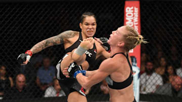 LAS VEGAS, NV - JULY 06: Amanda Nunes of Brazil kicks Holly Holm in their UFC bantamweight championship fight during the UFC 239 event at T-Mobile Arena on July 6, 2019 in Las Vegas, Nevada. (Photo by Josh Hedges/Zuffa LLC/Zuffa LLC)