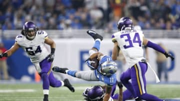 Nov 24, 2016; Detroit, MI, USA; Detroit Lions wide receiver Marvin Jones (11) gets tackled by Minnesota Vikings cornerback Trae Waynes (26) during the fourth quarter at Ford Field. Lions win 16-13. Mandatory Credit: Raj Mehta-USA TODAY Sports