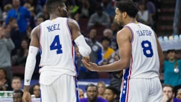 Dec 1, 2015; Philadelphia, PA, USA; Philadelphia 76ers forward Nerlens Noel (4) and center Jahlil Okafor (8) celebrate a score against the Los Angeles Lakers during the second half at Wells Fargo Center. The 76ers won 103-91. Mandatory Credit: Bill Streicher-USA TODAY Sports
