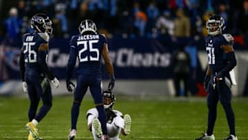 NASHVILLE, TN - DECEMBER 6: Adoree' Jackson #25 of the Tennessee Titans stands over Donte Moncrief #10 of the Jacksonville Jaguars after tackling him during the fourth quarter at Nissan Stadium on December 6, 2018 in Nashville, Tennessee. (Photo by Silas Walker/Getty Images)