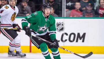 Mar 21, 2015; Dallas, TX, USA; Dallas Stars left wing Curtis McKenzie (11) skates against the Chicago Blackhawks at the American Airlines Center. The Stars shut out the Blackhawks 4-0. Mandatory Credit: Jerome Miron-USA TODAY Sports