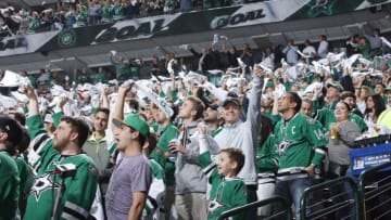 DALLAS, TX - APRIL 29: Dallas Stars fans cheer on their team against the St. Louis Blues in Game One of the Western Conference Second Round during the 2016 NHL Stanley Cup Playoffs at the American Airlines Center on April 29, 2016 in Dallas, Texas. (Photo by Glenn James/NHLI via Getty Images) *** Local Caption ***