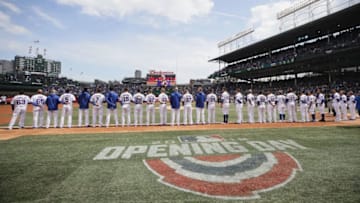 FanDuel MLB: CHICAGO, IL - APRIL 10: Members of the Chicago Cubs stand during the National Anthem before the Opening Day home game against the Pittsburgh Pirates at Wrigley Field on April 10, 2018 in Chicago, Illinois. (Photo by Jonathan Daniel/Getty Images)