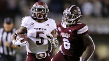 STARKVILLE, MS - OCTOBER 27: Trayveon Williams #5 of the Texas A&M Aggies runs with the ball as Willie Gay Jr. #6 of the Mississippi State Bulldogs defends during the second half at Davis Wade Stadium on October 27, 2018 in Starkville, Mississippi. (Photo by Jonathan Bachman/Getty Images)