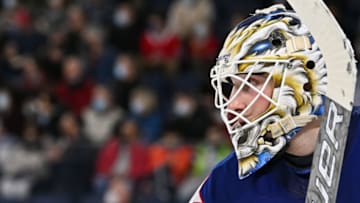 LAVAL, QC - APRIL 08: Goaltender Ukko-Pekka Luukkonen #1 of the Rochester Americans remains focused during the second period against the Laval Rocket at Place Bell on April 8, 2022 in Laval, Canada. The Laval Rocket defeated the Rochester Americans 4-3 in overtime. (Photo by Minas Panagiotakis/Getty Images)