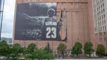 CLEVELAND, OH - JULY 3: Workers remove the Nike LeBron James banner from the Sherwin-Williams building near Quicken Loans Arena on July 3, 2018 in Cleveland, Ohio. NOTE TO USER: User expressly acknowledges and agrees that, by downloading and or using this photograph, User is consenting to the terms and conditions of the Getty Images License Agreement. (Photo by Jason Miller/Getty Images)