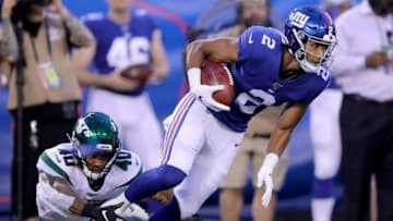 EAST RUTHERFORD, NEW JERSEY - AUGUST 08: TJ Jones #2 of the New York Giants returns a punt as Kyron Brown #40 of the New York Jets in the first quarter during a preseason matchup at MetLife Stadium on August 08, 2019 in East Rutherford, New Jersey. (Photo by Elsa/Getty Images)
