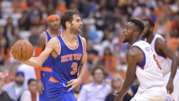 Oct 14, 2014; Syracuse, NY, USA; New York Knicks guard Jose Calderon (3) dribble thwe ball as Philadelphia 76ers guard Tony Wroten (8) defending during the third quarter of a pre-season game at the Carrier Dome. The Knicks won 84-77. Mandatory Credit: Mark Konezny-USA TODAY Sports
