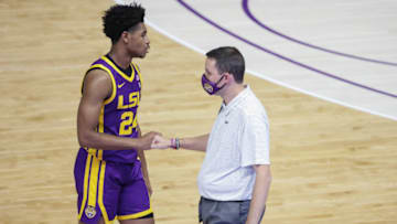 Nov 30, 2020; Baton Rouge, Louisiana, USA; LSU Tigers head coach Will Wade and guard Cameron Thomas (24) during the first half against the Southeastern Louisiana Lions at the Pete Maravich Assembly Center. Mandatory Credit: Derick E. Hingle-USA TODAY Sports