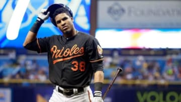 Jul 24, 2015; St. Petersburg, FL, USA; Baltimore Orioles designated hitter Jimmy Paredes (38) strikes out works out prior to the game against the Tampa Bay Rays at Tropicana Field. Mandatory Credit: Kim Klement-USA TODAY Sports