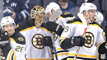 Oct 17, 2016; Winnipeg, Manitoba, CAN; Boston Bruins goalie Tuukka Rask (40) celebrates a victory over the Winnipeg Jets after the third period at the MTS Centre. Boston won 4-1. Mandatory Credit: Bruce Fedyck-USA TODAY Sports