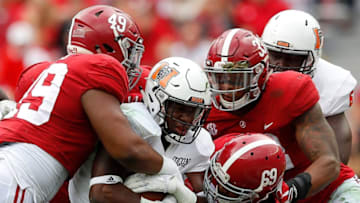 Isaiah Buggs #49, Joshua Frazier #69 and Anfernee Jennings #33 of the Alabama Crimson Tide(Photo by Kevin C. Cox/Getty Images)
