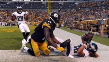 Aug 18, 2016; Pittsburgh, PA, USA; Philadelphia Eagles cornerback Aaron Grymes (38) intercepts a pass in front of Pittsburgh Steelers wide receiver Sammie Coates (14) during the first half of their game at Heinz Field. Mandatory Credit: Jason Bridge-USA TODAY Sports