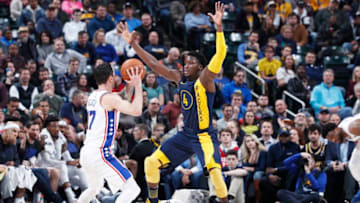 INDIANAPOLIS, IN - FEBRUARY 03: Victor Oladipo #4 of the Indiana Pacers defends against JJ Redick #17 of the Philadelphia 76ers in the first half of a game at Bankers Life Fieldhouse on February 3, 2018 in Indianapolis, Indiana. The Pacers won 100-92. NOTE TO USER: User expressly acknowledges and agrees that, by downloading and or using the photograph, User is consenting to the terms and conditions of the Getty Images License Agreement. (Photo by Joe Robbins/Getty Images)