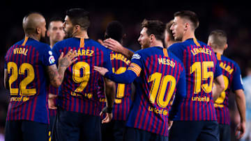 BARCELONA, SPAIN - DECEMBER 22: Lionel Messi of FC Barcelona celebrates with teammates after scoring his team's second goal during the La Liga match between FC Barcelona and RC Celta de Vigo at Camp Nou on December 22, 2018 in Barcelona, Spain. (Photo by Alex Caparros/Getty Images)