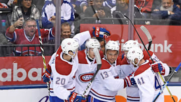 TORONTO, ON - OCTOBER 05: Montreal Canadiens Center Max Domi (13) celebrates a goal with Left Wing Paul Byron (41) and Defenceman Cale Fleury (20) during the regular season NHL game between the Montreal Canadiens and Toronto Maple Leafs on October 5, 2019 at Scotiabank Arena in Toronto, ON. (Photo by Gerry Angus/Icon Sportswire via Getty Images)