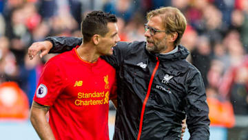 SWANSEA, WALES - OCTOBER 01: (L-R) Dejan Lovren of Liverpool and Manager of Liverpool, Jurgen Klopp after final whistle of the the Premier League match between Swansea City and Liverpool at The Liberty Stadium on October 1, 2016 in Swansea, Wales. (Photo by Athena Pictures/Getty Images)