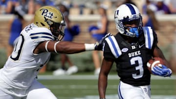 DURHAM, NC - OCTOBER 21: James Folston Jr. #40 of the Pittsburgh Panthers tries to stop T.J. Rahming #3 of the Duke Blue Devils during their game at Wallace Wade Stadium on October 21, 2017 in Durham, North Carolina. (Photo by Streeter Lecka/Getty Images)