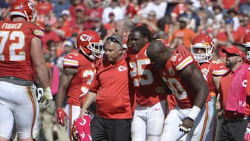 Oct 11, 2015; Kansas City, MO, USA; Kansas City Chiefs running back Jamaal Charles (25) is helped off the field against the Chicago Bears in the second half at Arrowhead Stadium. Chicago won the game 18-17. Mandatory Credit: John Rieger-USA TODAY Sports