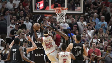 Miami Heat forward Jimm Butler (22) tries to score over Brooklyn Nets forward Royce O'Neale (00) during the fourth quarter( Michael Laughlin-USA TODAY Sports)