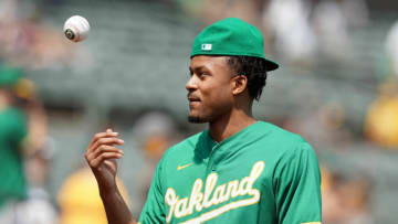 Aug 28, 2021; Oakland, California, USA; Golden State Warriors guard Moses Moody prepares to throw out the ceremonial first pitch before the game between the Oakland Athletics and the New York Yankees at RingCentral Coliseum. Mandatory Credit: Darren Yamashita-USA TODAY Sports