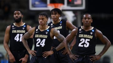 INDIANAPOLIS, INDIANA - MARCH 22: Jeriah Horne #41 of the Colorado Buffaloes, Eli Parquet #24 of the Colorado Buffaloes and McKinley Wright IV #25 of the Colorado Buffaloes and teammates on the court during the second half against the Florida State Seminoles in the second round game of the 2021 NCAA Men's Basketball Tournament at Indiana Farmers Coliseum on March 22, 2021 in Indianapolis, Indiana. (Photo by Maddie Meyer/Getty Images)