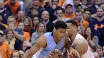Jan 9, 2016; Syracuse, NY, USA; North Carolina Tar Heels forward Isaiah Hicks (4) drives the ball past Syracuse Orange center DaJuan Coleman (32) during the second half of a game at the Carrier Dome. North Carolina won 84-73. Mandatory Credit: Mark Konezny-USA TODAY Sports