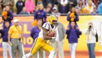 Jan 1, 2014; Tampa, Fl, USA; LSU Tigers wide receiver Odell Beckham (3) runs against the Iowa Hawkeyes during the second half at Raymond James Stadium. Mandatory Credit: Steve Mitchell-USA TODAY Sports