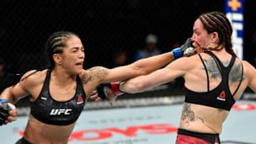 EDMONTON, ALBERTA - JULY 27: (L-R) Viviane Araujo of Brazil punches Alexis Davis of Canada in their flyweight bout during the UFC 240 event at Rogers Place on July 27, 2019 in Edmonton, Alberta, Canada. (Photo by Jeff Bottari/Zuffa LLC/Zuffa LLC)dav