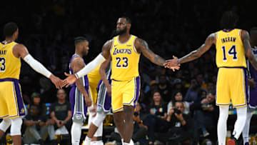 LOS ANGELES, CA - OCTOBER 04: LeBron James #23 of the Los Angeles Lakers is congratulated by his teammate Brandon Ingram #14 and Josh Hart #3 after scoring a basket and getting fouled against Sacramento Kings during the first half at Staples Center on October 4, 2018 in Los Angeles, California. NOTE TO USER: User expressly acknowledges and agrees that, by downloading and or using this photograph, User is consenting to the terms and conditions of the Getty Images License Agreement. (Photo by Kevork Djansezian/Getty Images)