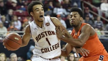Jan 1, 2017; Chestnut Hill, MA, USA; Boston College Eagles guard Jerome Robinson (1) drives to the basket past Syracuse Orange guard John Gillon (4) during the second half at Silvio O. Conte Forum. Mandatory Credit: Bob DeChiara-USA TODAY Sports