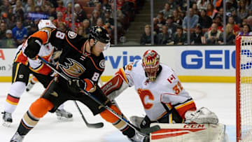 Mar 30, 2016; Anaheim, CA, USA; Calgary Flames goalie Niklas Backstrom (32) makes a save on a shot by Anaheim Ducks left wing Jamie McGinn (88) in the second period of the game at Honda Center. Mandatory Credit: Jayne Kamin-Oncea-USA TODAY Sports