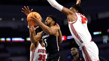 Cincinnati Bearcats guard David DeJulius drives to the basket against the Houston Cougars in the American Athletic Conference Tournament Quarterfinals at Dickies Arena. Getty Images.